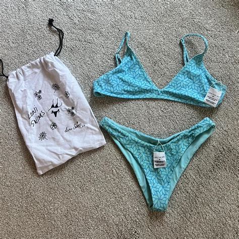 Leni swims - 47 reviews. $67.00 USD. Print: Coco Reversible. Size: XS S M L XL. Add to cart. Our reversible triangle top you'll find yourself reaching for over and over. The perfect combination of style and comfort, reverse this top for two sets in one.
